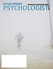 Winter LAP Magazine Man bike riding in fog